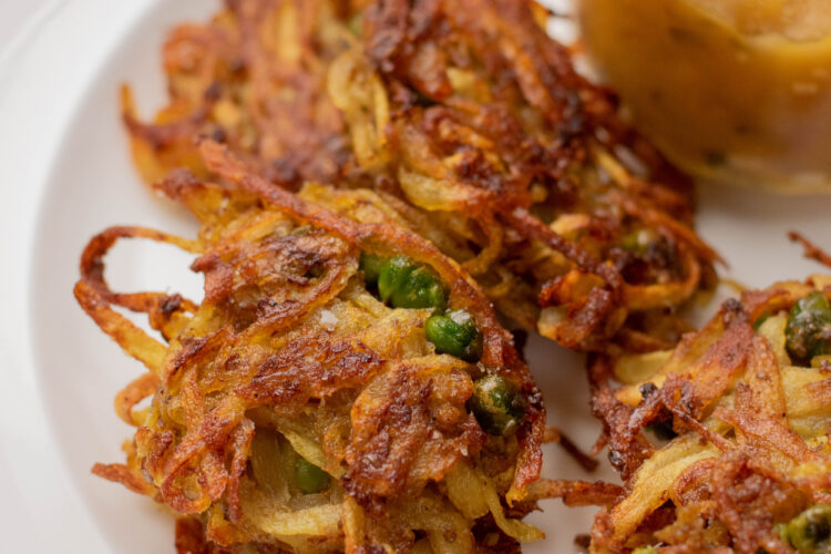 fried potato pancakes with peas